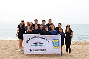 Am Strand -Teamfoto mit Trainern 